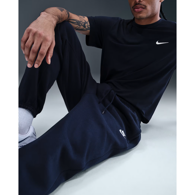 Pantaloni da uomo in pile spazzolato con risvolto Nike FN3808-451